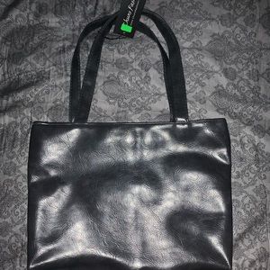 Brand new pocket book with the tags still attached